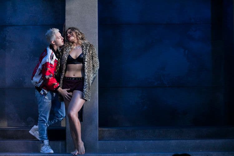Countertenor Jake Arditti sings to mezzo-soprano Helen Sherman, while she leans against a wall, in a scene from Pinchgut Opera's production of Coronation of Poppea