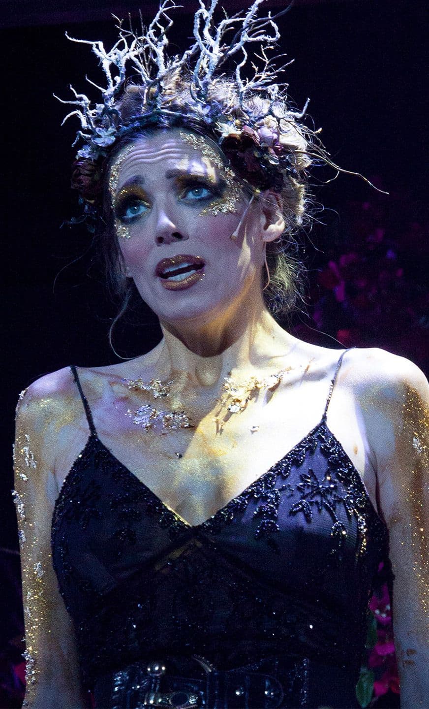 A singer with a thorny crown on her head, on stage in Pinchgut Opera's production of Armida